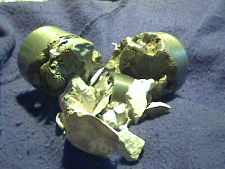 Metal Cylinder Crumpled Apart